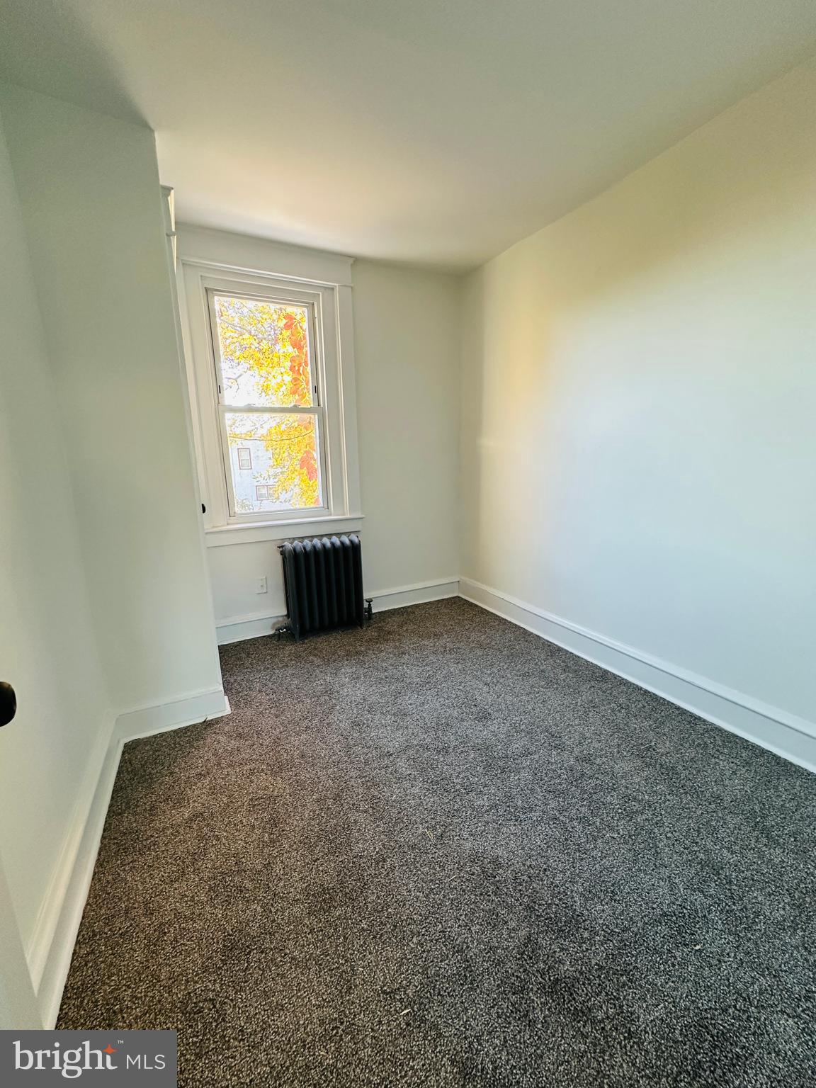 149 Wayne Avenue Collingdale, PA 19023 - Photo 23 of 28 an empty room with a window