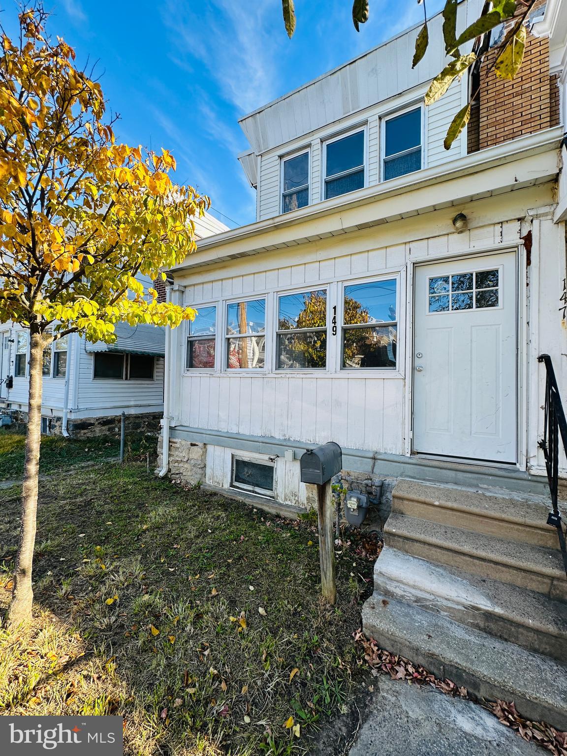 149 Wayne Avenue Collingdale, PA 19023 - Photo 3 of 28 a front view of a house with a yard
