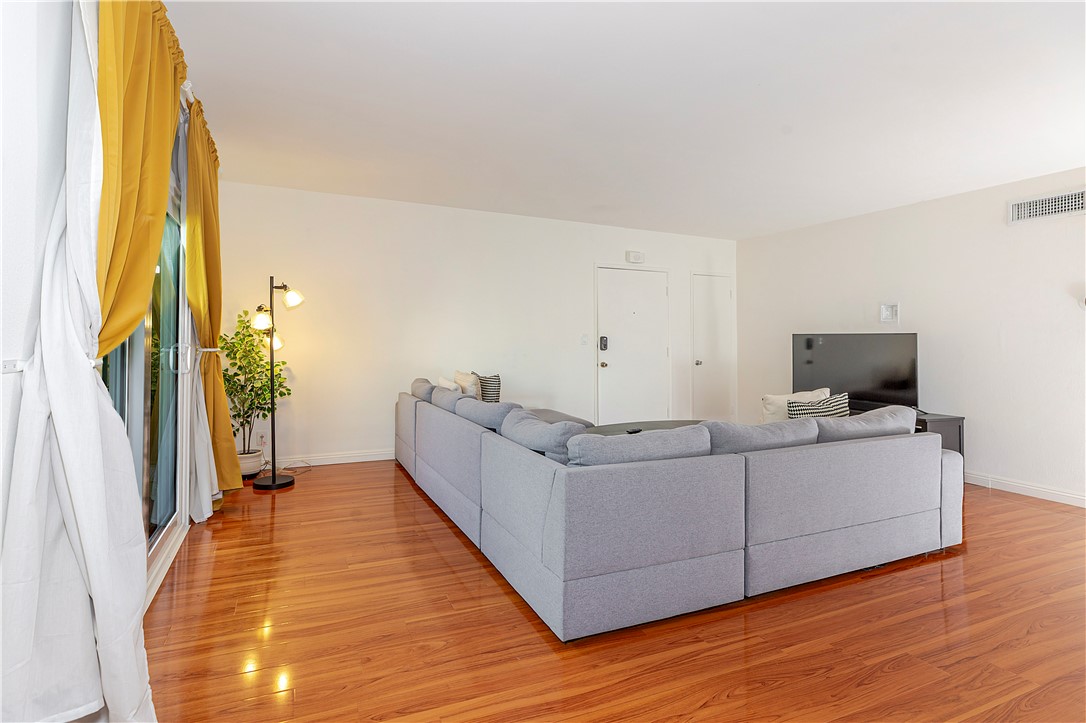5400 Newcastle Avenue, Unit 70 Encino, CA 91316 - Photo 17 of 32 a living room with furniture and a flat screen tv