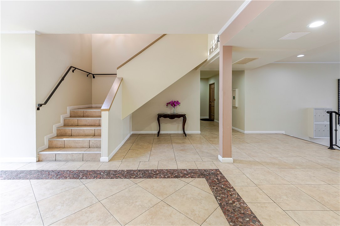5400 Newcastle Avenue, Unit 70 Encino, CA 91316 - Photo 2 of 32 a view of a hallway view with staircase