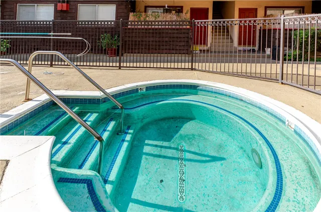 a view of a pathway with a flower in a corridor