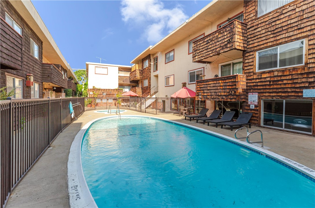 5400 Newcastle Avenue, Unit 70 Encino, CA 91316 - Photo 25 of 32 swimming pool view with a outdoor seating