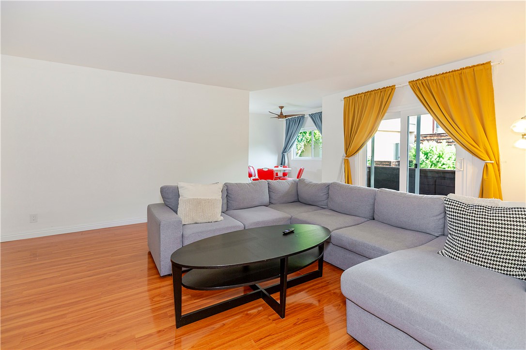 5400 Newcastle Avenue, Unit 70 Encino, CA 91316 - Photo 5 of 32 a living room with furniture and a large window