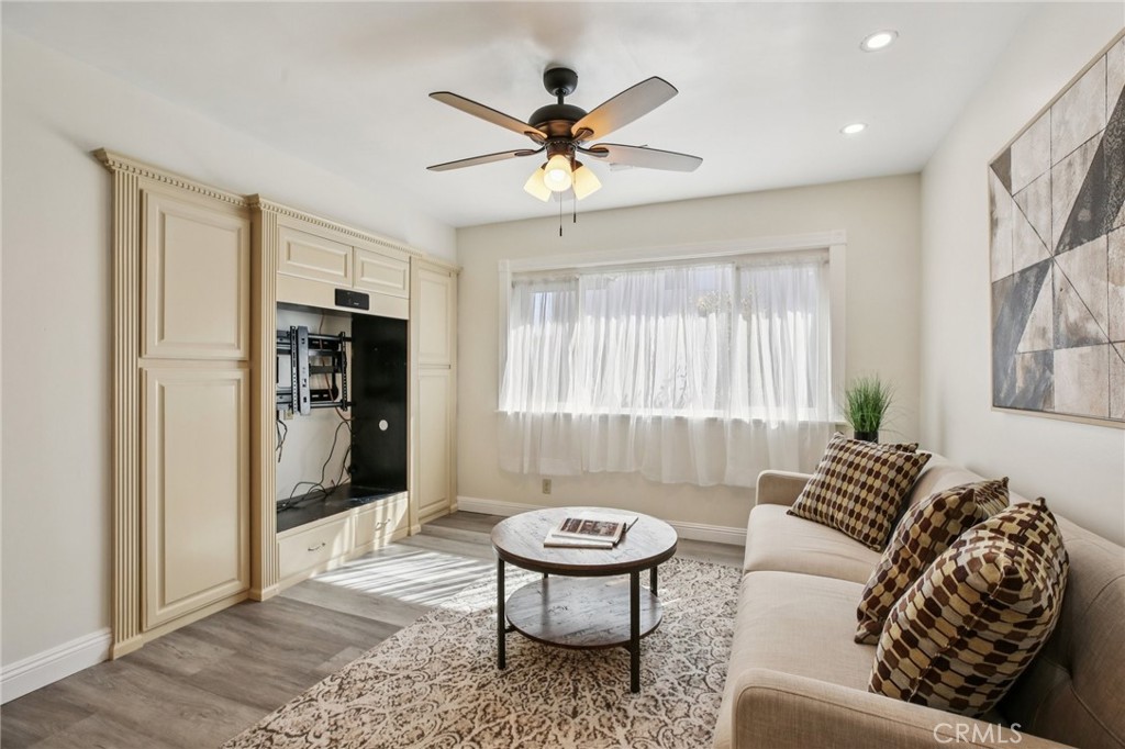 367 Ultimo Avenue Long Beach, CA 90814 - Photo 12 of 37 a living room with furniture and a window