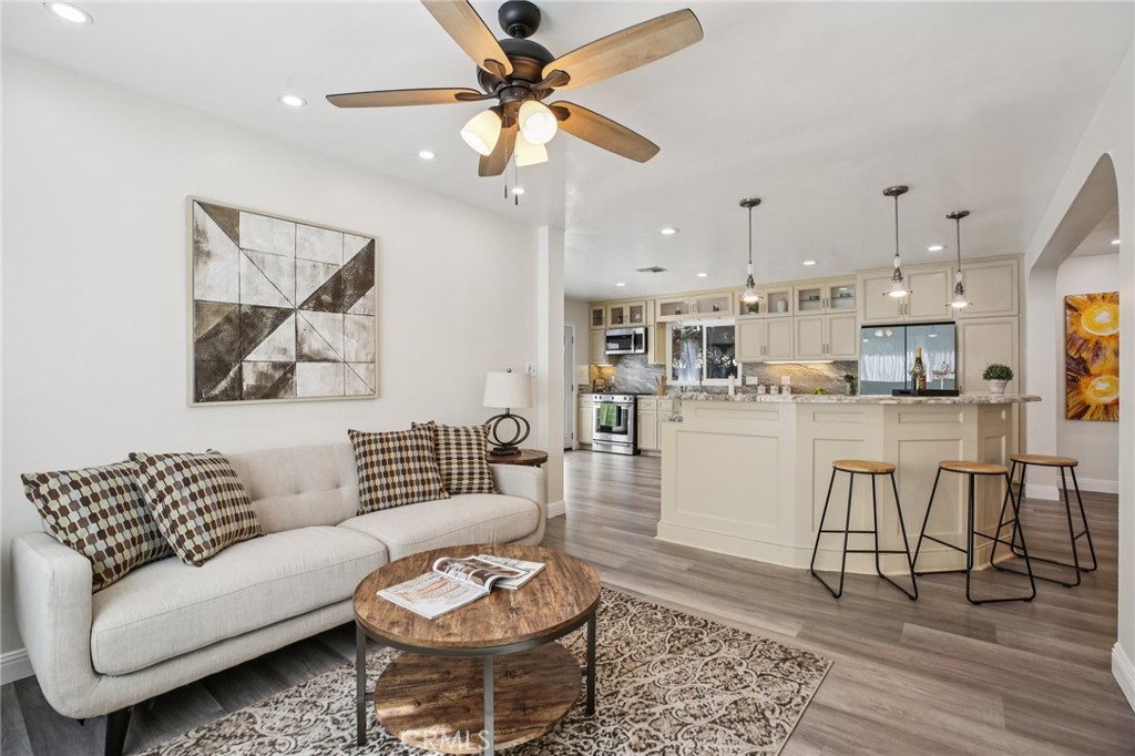 367 Ultimo Avenue Long Beach, CA 90814 - Photo 13 of 37 a living room with furniture and kitchen view