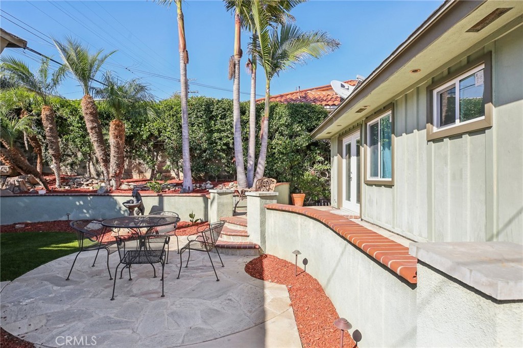 367 Ultimo Avenue Long Beach, CA 90814 - Photo 36 of 37 a view of swimming pool with a patio and a yard