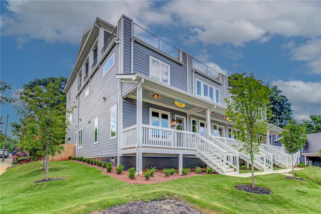 front view of a house with a yard