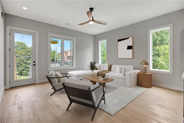 a living room with furniture and a window
