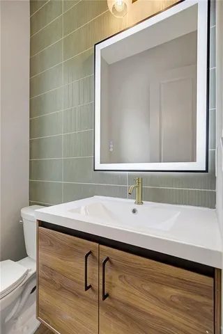 a bathroom with a sink and a toilet