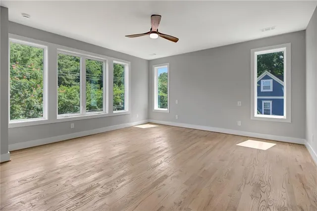 a bathroom with double sink and a mirror