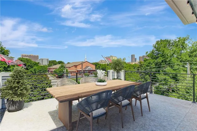 a view of a big room with a large window