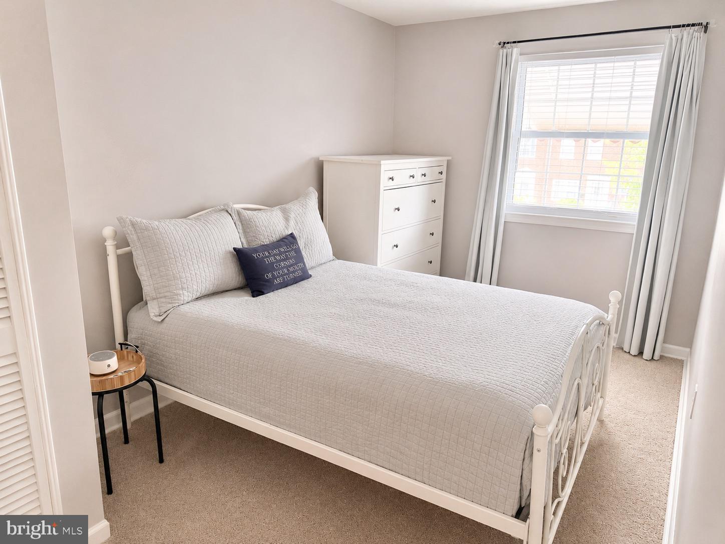 2235 Southorn Road Baltimore, MD 21220 - Photo 14 of 33 a bedroom with a bed and a window