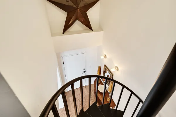 a living room with a bed