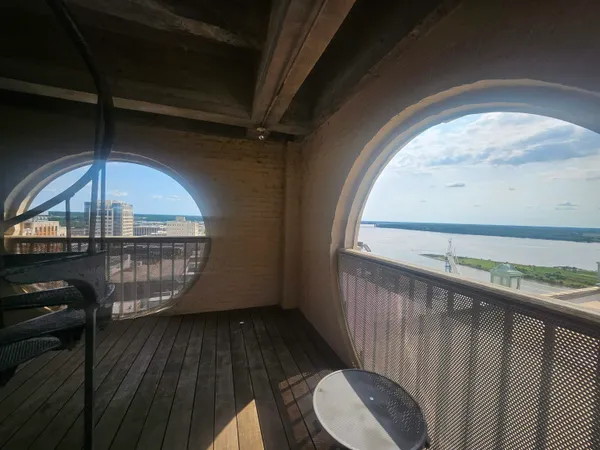 a view of a balcony with a fireplace