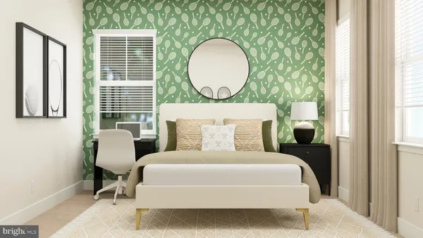 a bed sitting in a bedroom next to a window