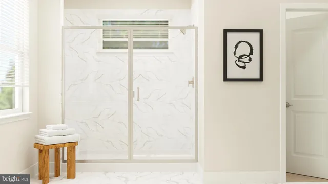 a close up of a door with a shower