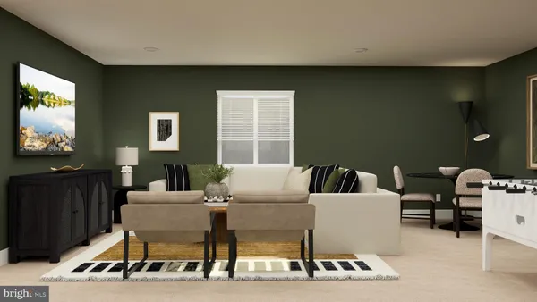 a living room with furniture a flat screen tv and a window