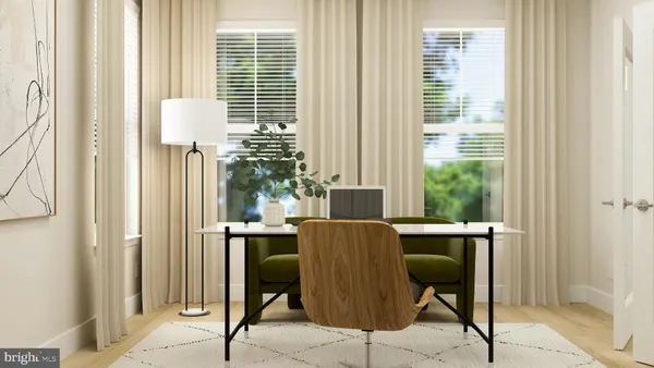a dining room with furniture and a window