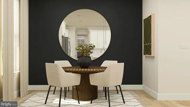 view of a dining room with furniture and wooden floor