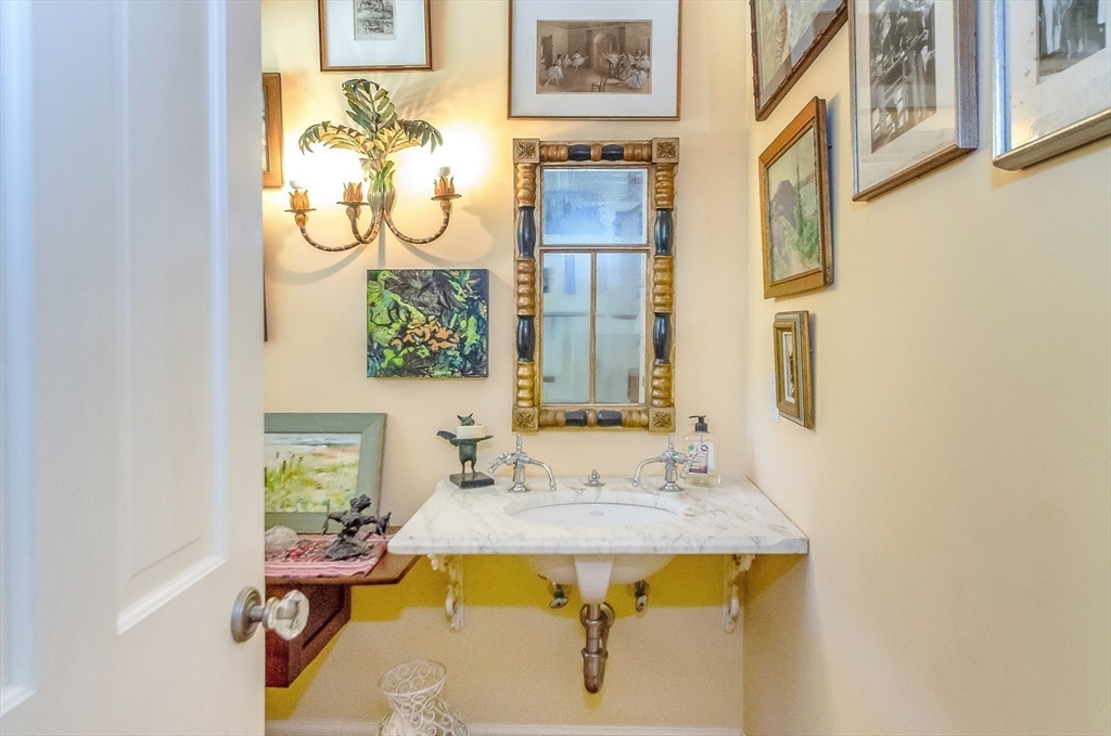 414 Point Road Marion, MA 02738 - Photo 18 of 42 a bathroom with a sink and a mirror