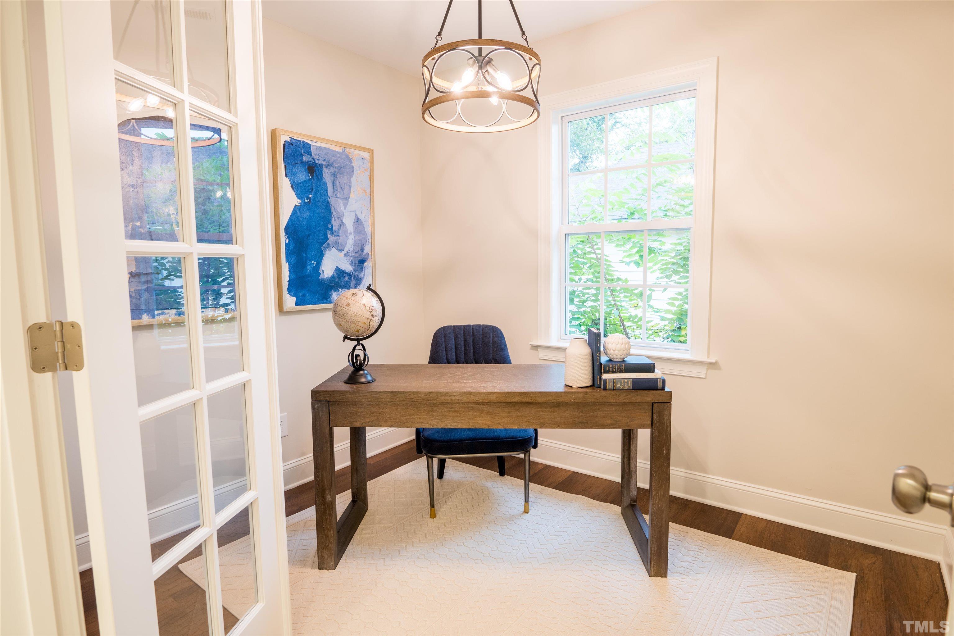 910 South East Street Raleigh, NC 27601 - Photo 11 of 17 a view of a workspace with furniture