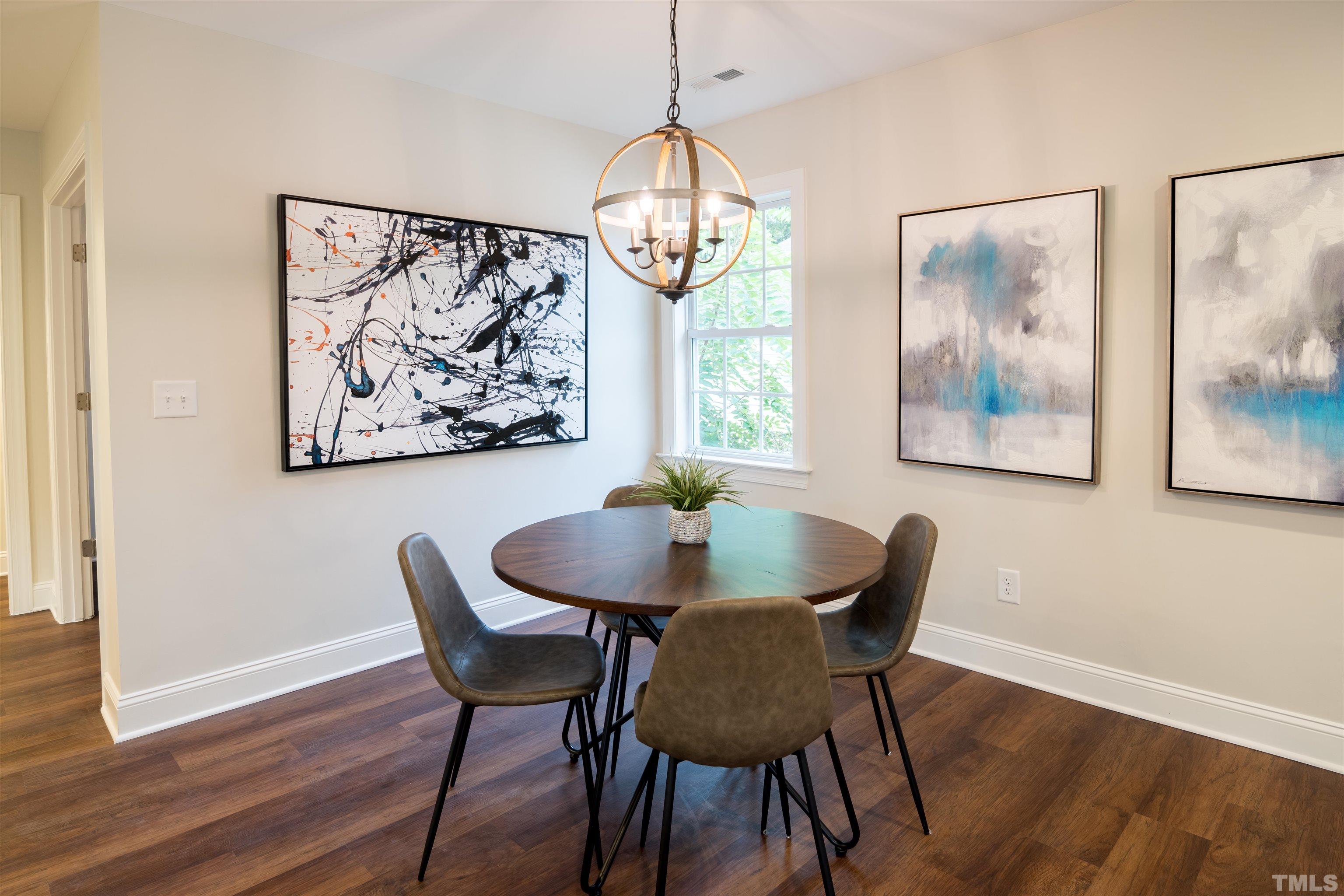 910 South East Street Raleigh, NC 27601 - Photo 16 of 17 a dining room with furniture and window
