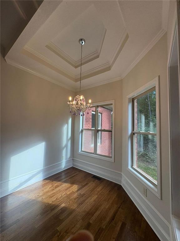 1487 Mt Zion Road Oxford, GA 30054 - Photo 4 of 18 wooden floor in an empty room with a window