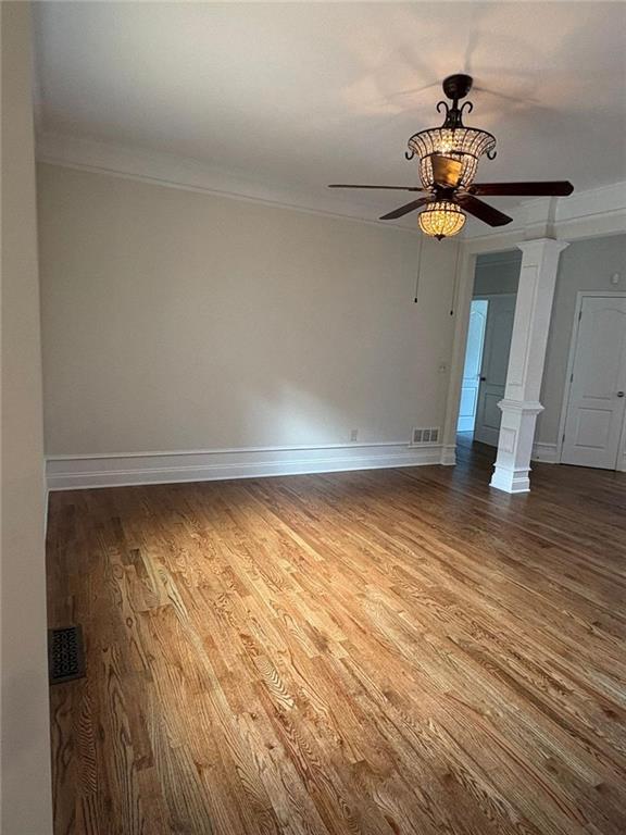 1487 Mt Zion Road Oxford, GA 30054 - Photo 6 of 18 a view of empty room with wooden floor