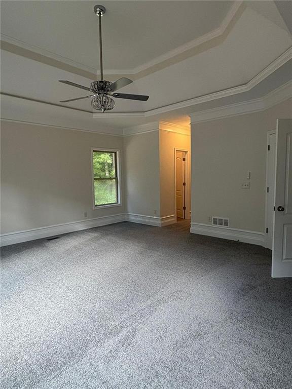 1487 Mt Zion Road Oxford, GA 30054 - Photo 10 of 18 a view of a livingroom with a chandelier fan and a window