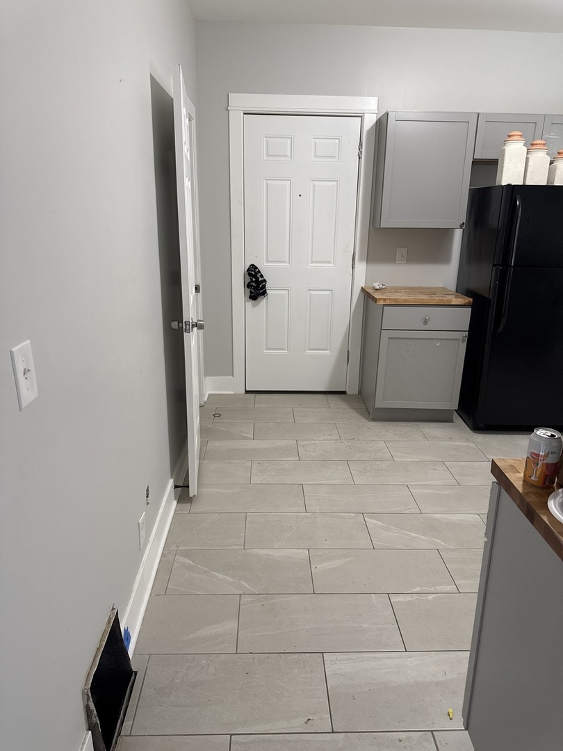 310 West 105th Street Chicago, IL 60628 - Photo 12 of 22 a view of a utility room with washer and dryer