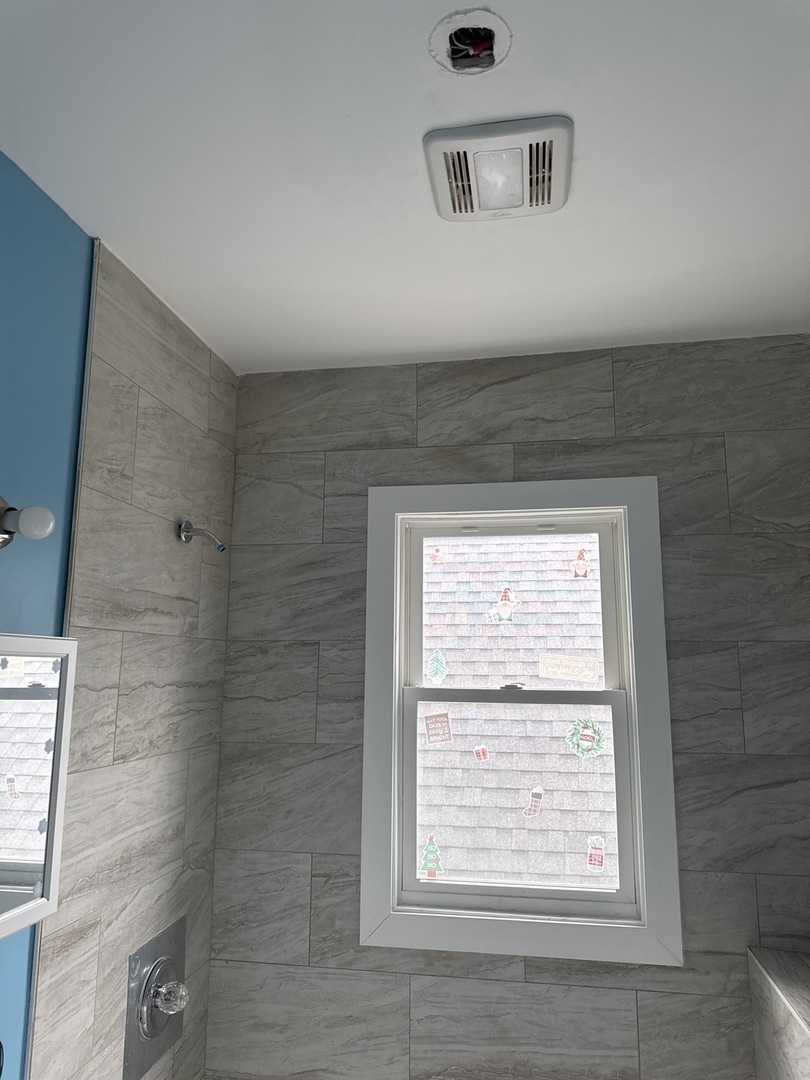 310 West 105th Street Chicago, IL 60628 - Photo 19 of 22 a view of an empty room with a window