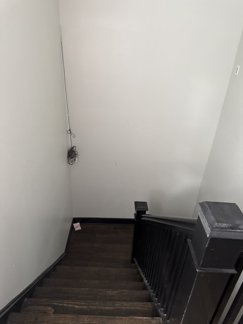 310 West 105th Street Chicago, IL 60628 - Photo 21 of 22 a view of entryway with wooden floor