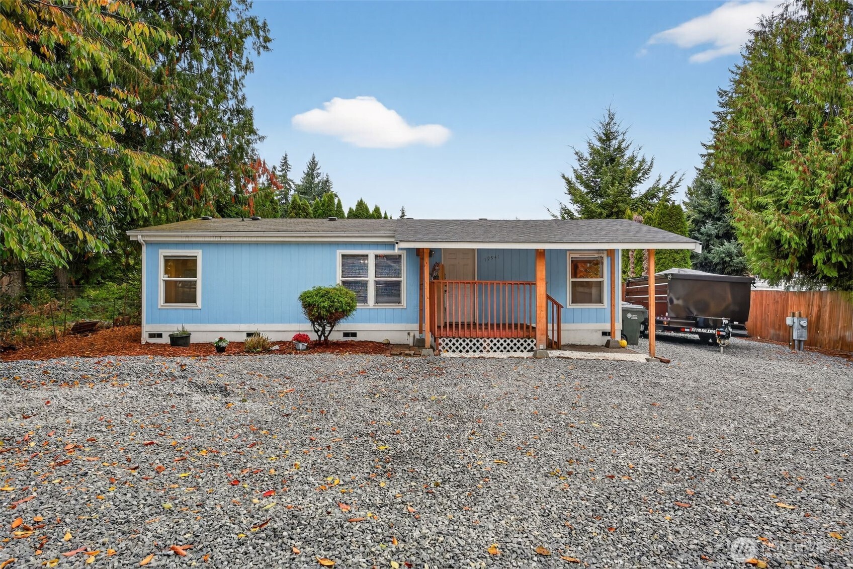 19941 Rhododendron Drive East Bonney Lake, WA 98391 - Photo 1 of 16 a view of a house with a patio