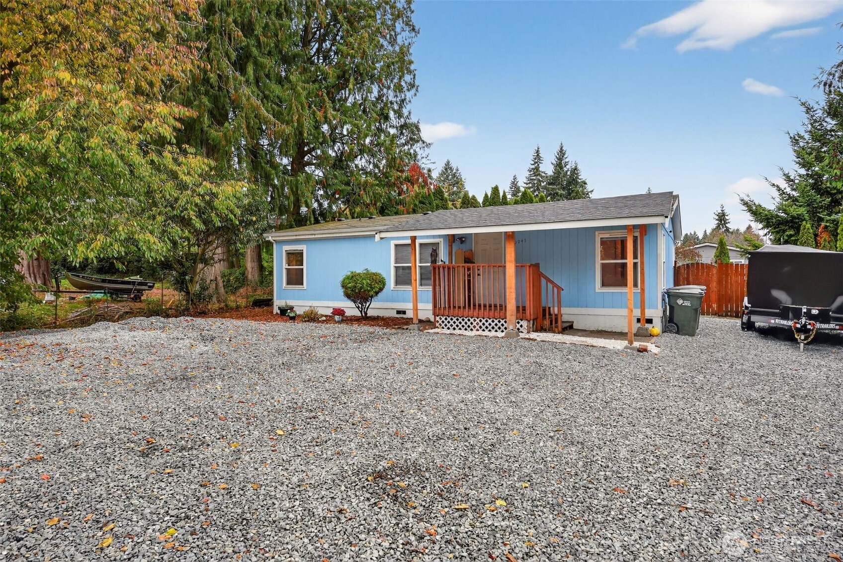 19941 Rhododendron Drive East Bonney Lake, WA 98391 - Photo 16 of 16 a view of a house with backyard and sitting area