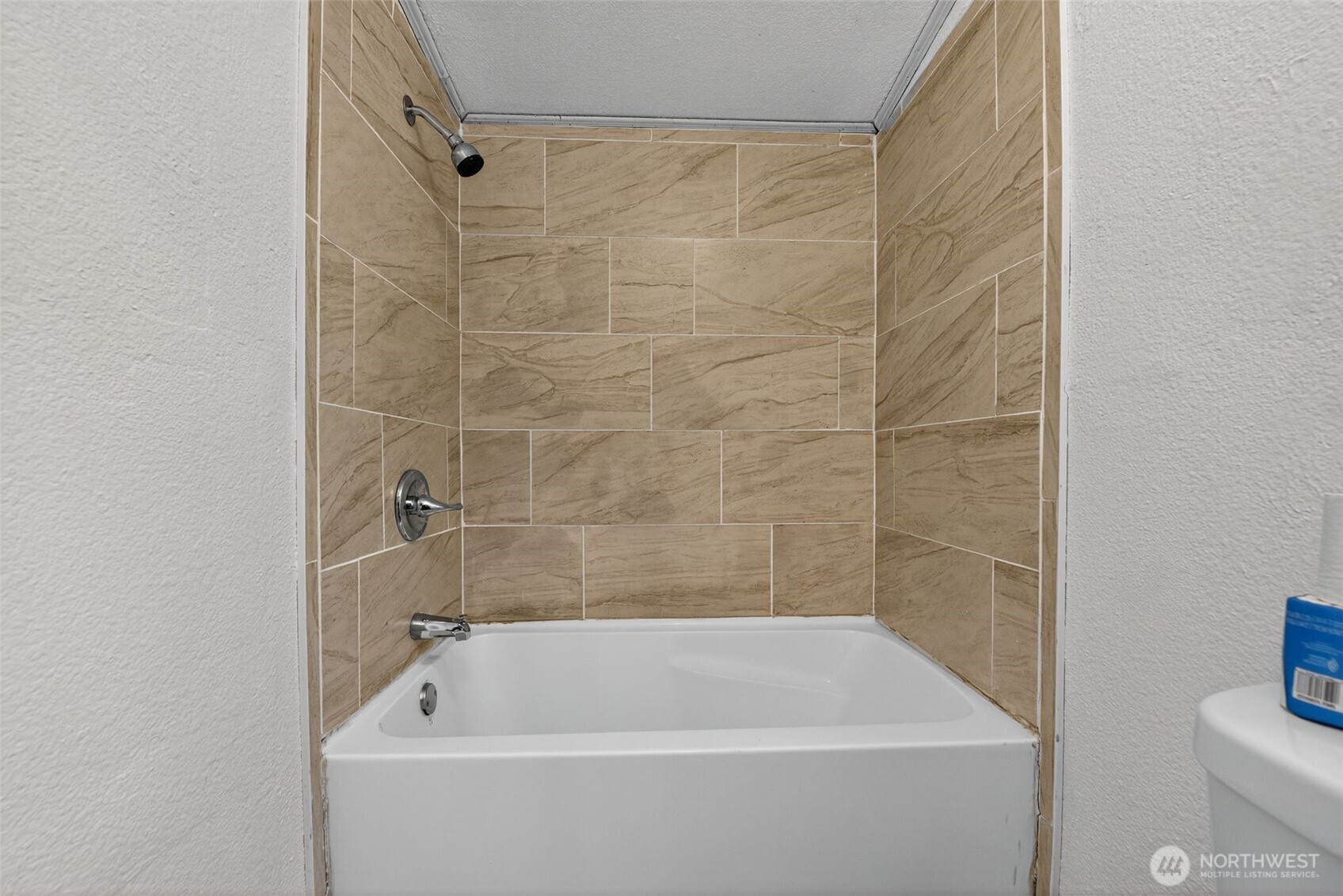 19941 Rhododendron Drive East Bonney Lake, WA 98391 - Photo 10 of 16 a bathroom with a bathtub