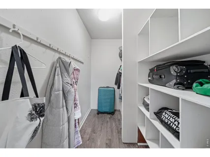 a bathroom with a sink toilet a mirror and shower