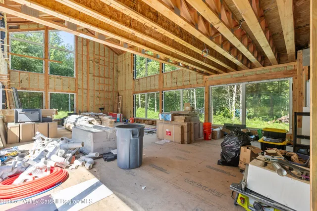 a living room with furniture and a table