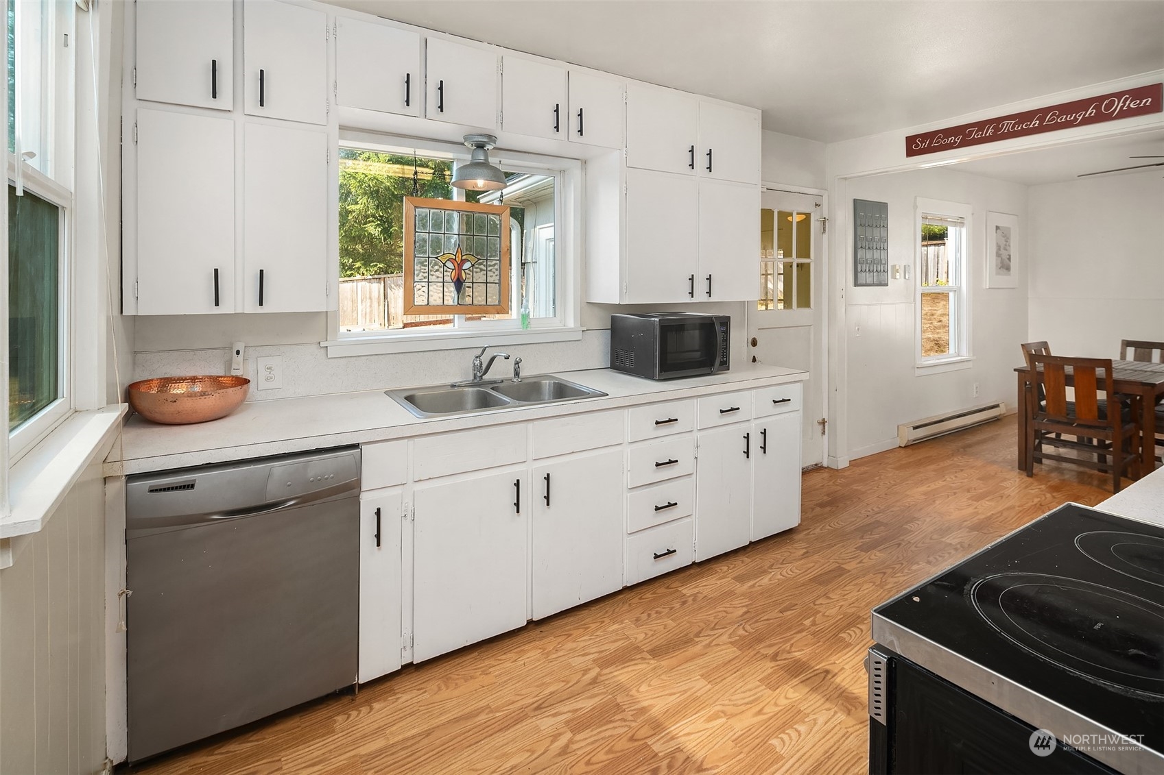 330 Highway 3 Shelton, WA 98584 - Photo 11 of 39 a kitchen with a stove a sink and a refrigerator