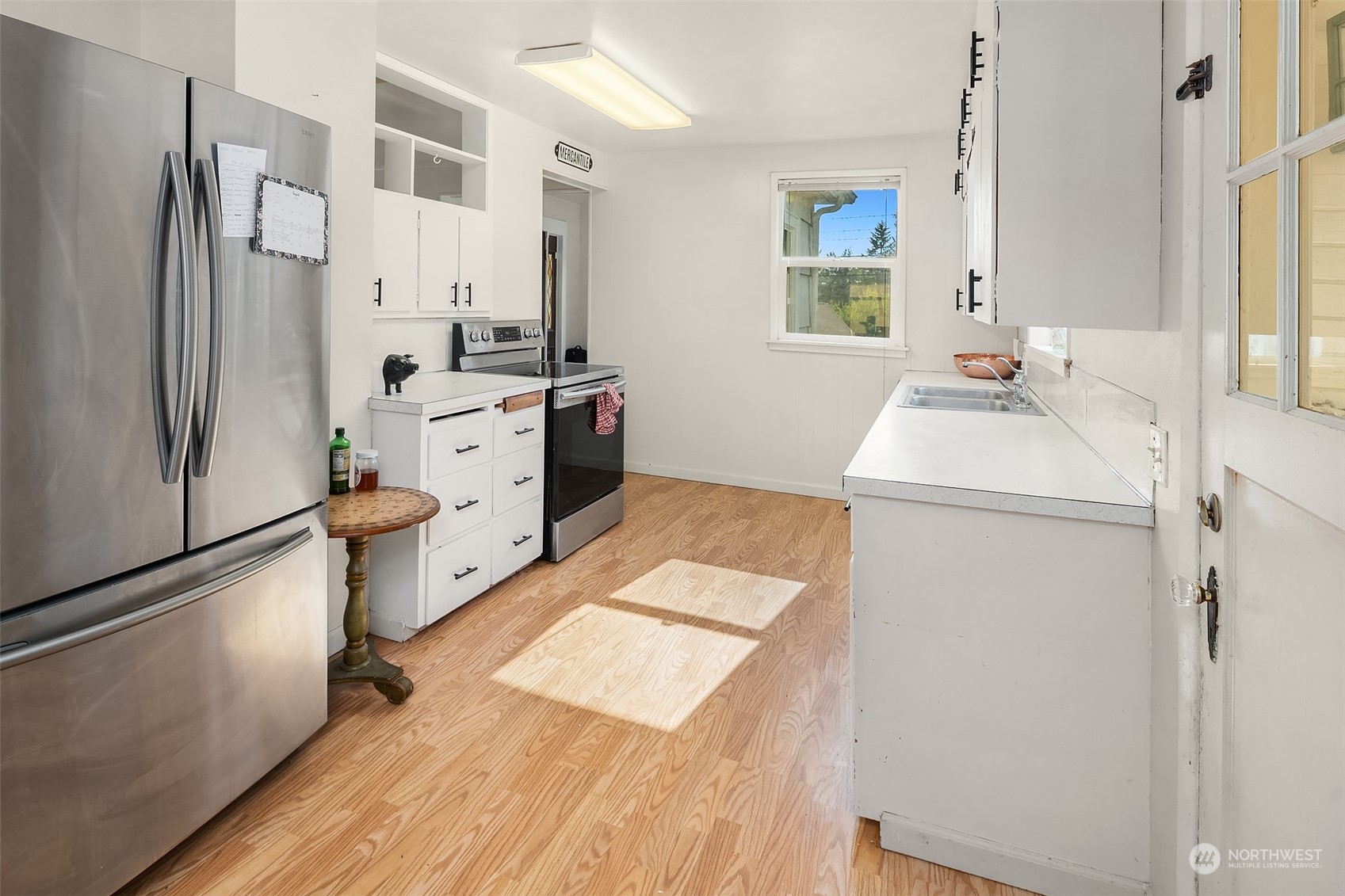 330 Highway 3 Shelton, WA 98584 - Photo 12 of 39 a kitchen with a refrigerator sink and stove