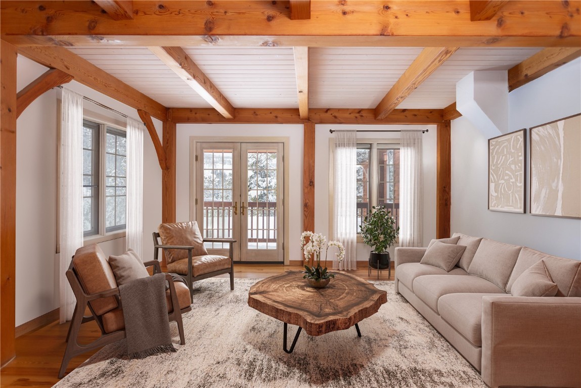 300 Gold Hill Road Breckenridge, CO 80424 - Photo 11 of 50 a living room with furniture and a large window