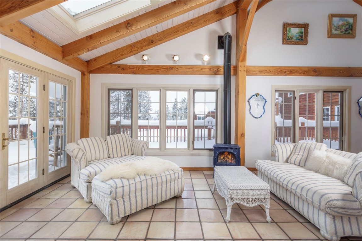 300 Gold Hill Road Breckenridge, CO 80424 - Photo 21 of 50 a spacious bedroom with a bed and a large window