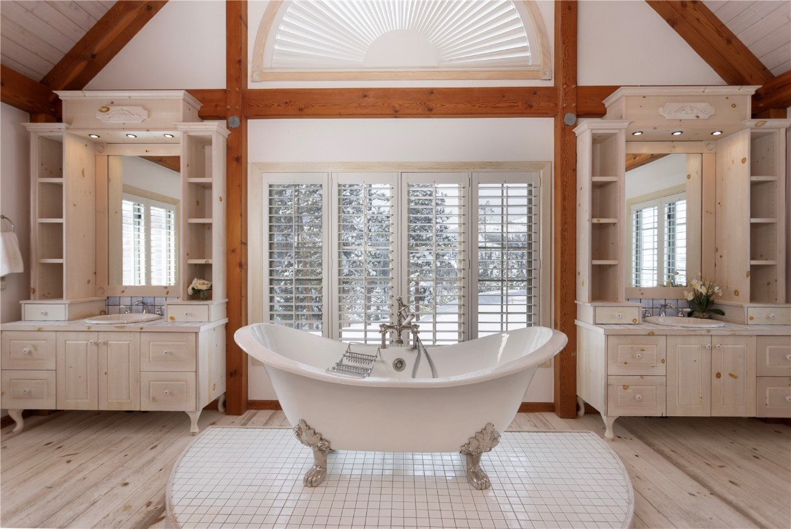 300 Gold Hill Road Breckenridge, CO 80424 - Photo 25 of 50 a spacious bathroom with a tub sink and mirror