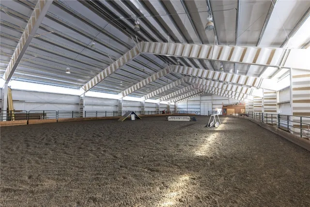 a bedroom with a bed and a fireplace