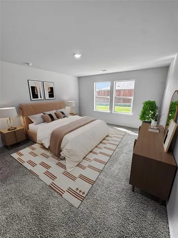 a bedroom with a bed and a couch