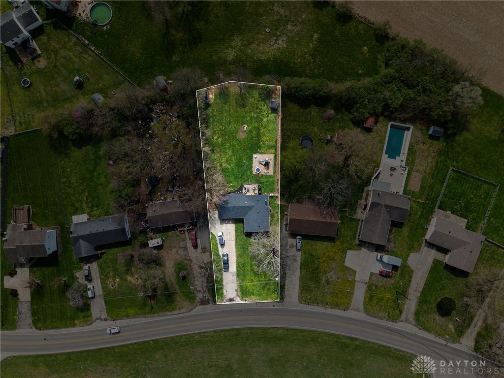 8969 Franklin-Trenton Road Franklin, OH 45005 - Photo 15 of 49 This captivating aerial view showcases the property's expansive lot, offering a lush green canvas for outdoor enjoyment.