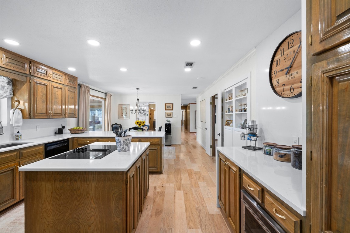 197 Live Oak Cemetery Road Killeen, TX 76542 - Photo 20 of 36 a kitchen with a stove a sink a refrigerator and cabinets