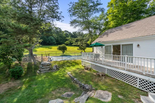 a view of a house with a swimming pool