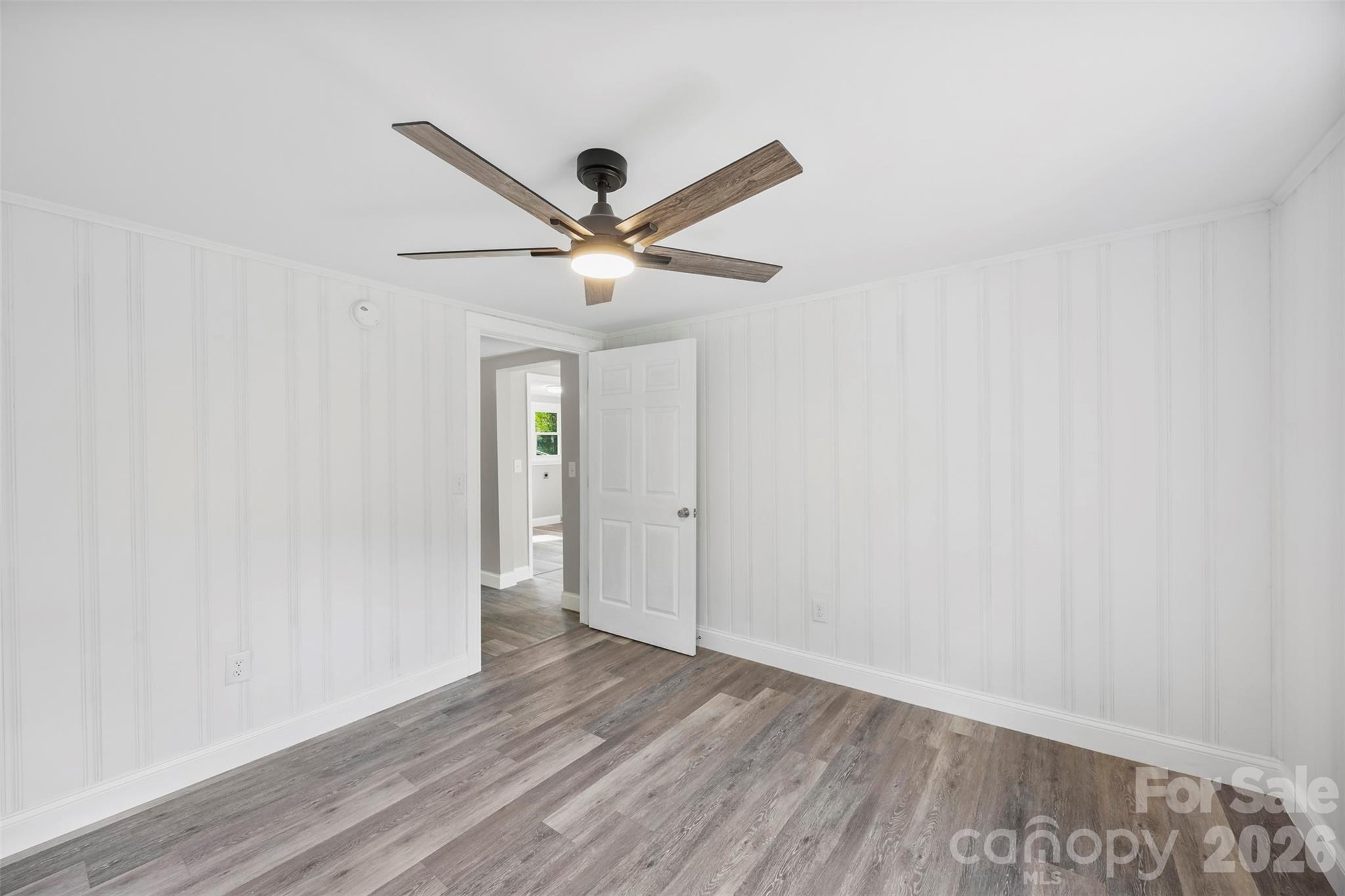 858 High Shoals Church Road Mooresboro, NC 28114 - Photo 15 of 25 a view of an empty room with wooden floor