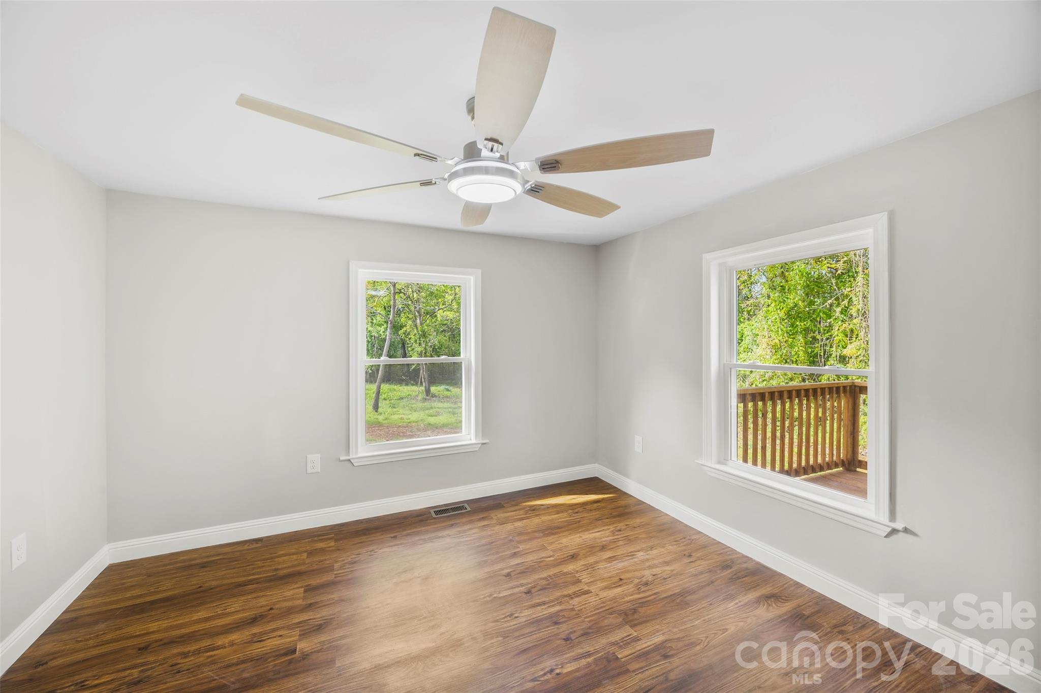 858 High Shoals Church Road Mooresboro, NC 28114 - Photo 19 of 25 a view of an empty room with wooden floor and a window