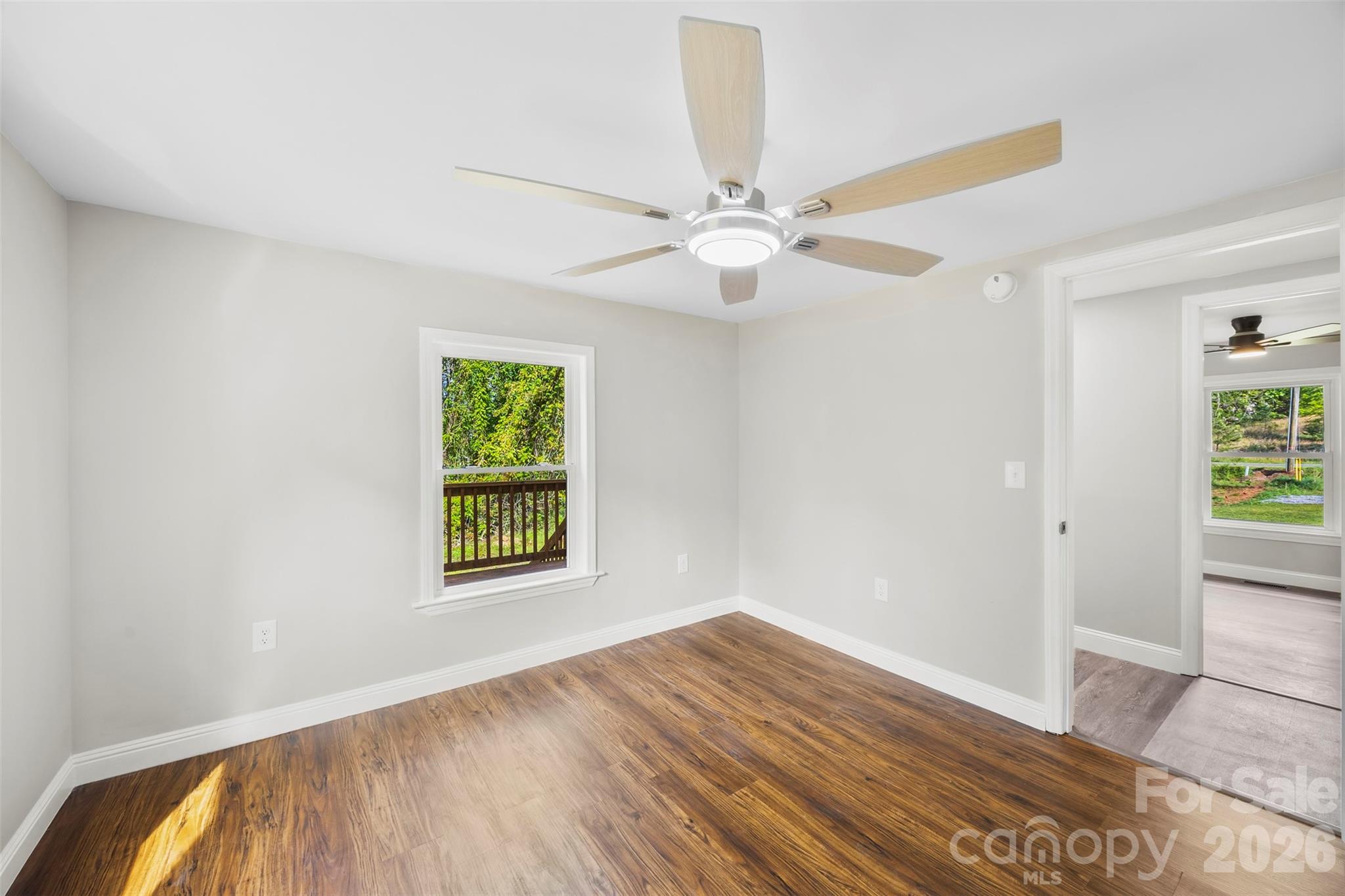 858 High Shoals Church Road Mooresboro, NC 28114 - Photo 20 of 25 wooden floor in an empty room with a window